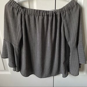 Off the shoulder blouse. 3/4 length sleeves.